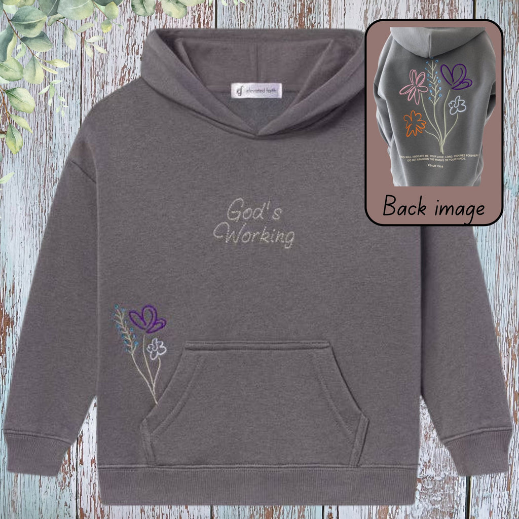 God's Working Children's Hoodie - front view with embroidered script and floral detail