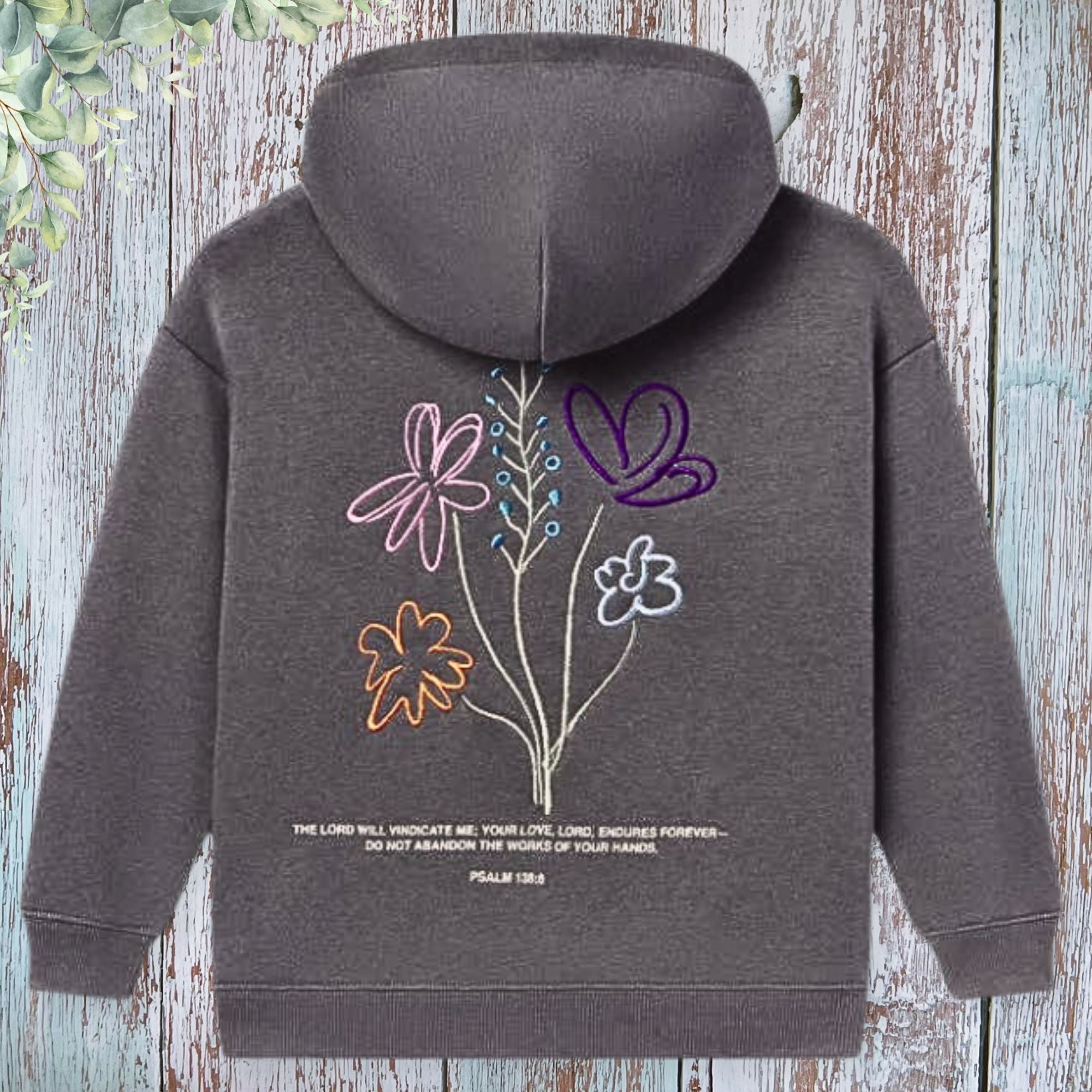 God's Working Children's Hoodie - back view with full floral embroidery and Psalm 138:8