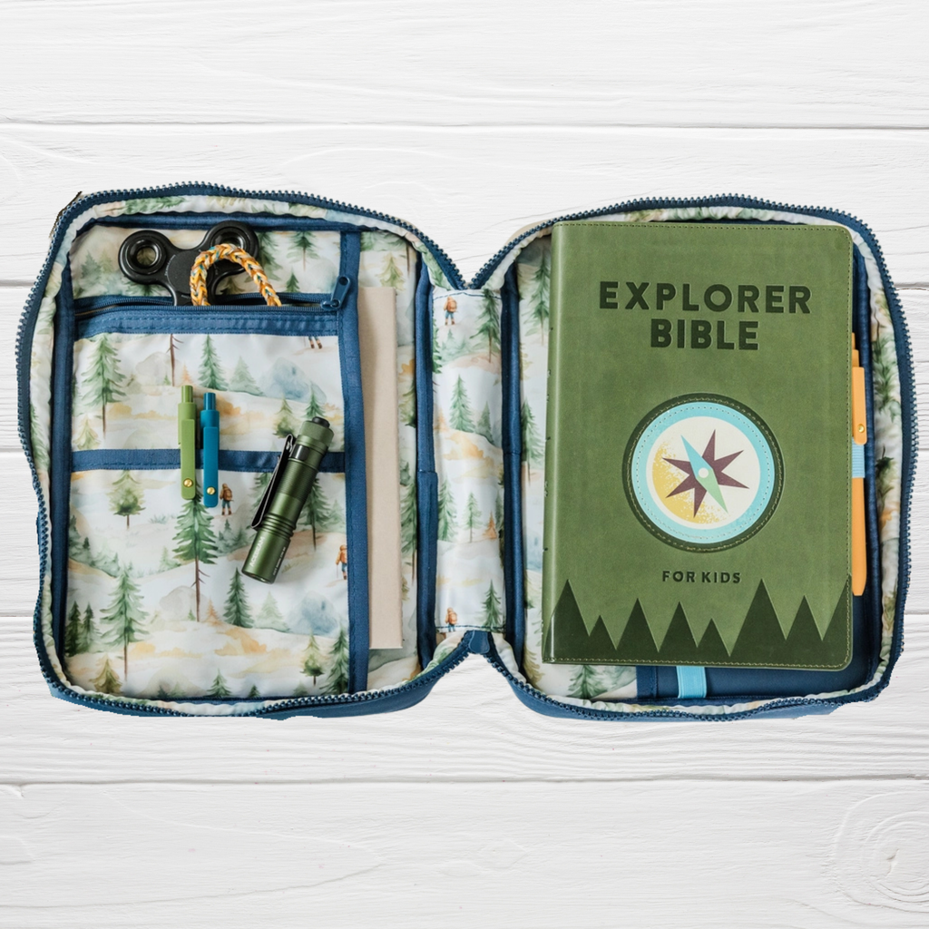Explorer Bible Bag open interior showing forest lining with Explorer Bible for Kids