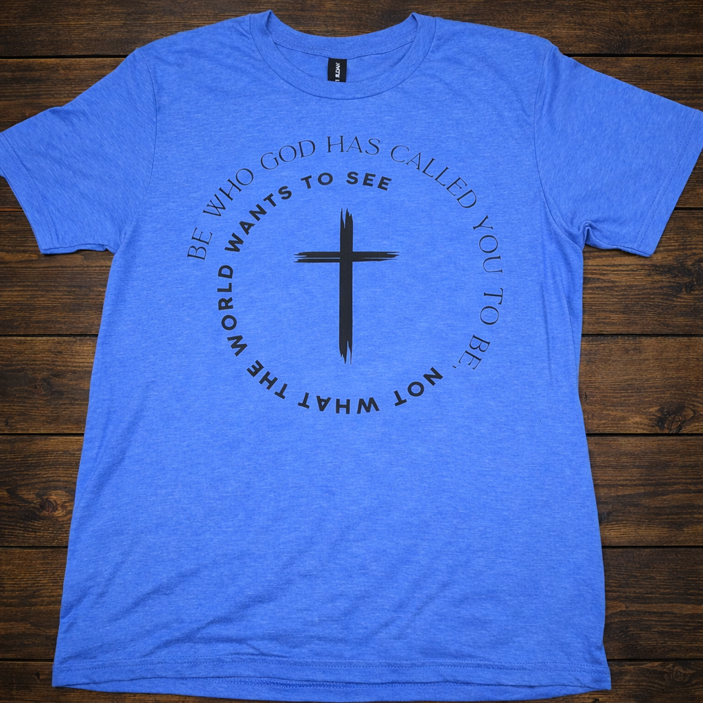 "Be Who God Has Called You To Be Christian t-shirt in Blue — circular cross graphic with 'Be Who God Has Called You To Be, Not What The World Wants To See' by Pressed in Faith by Anna"