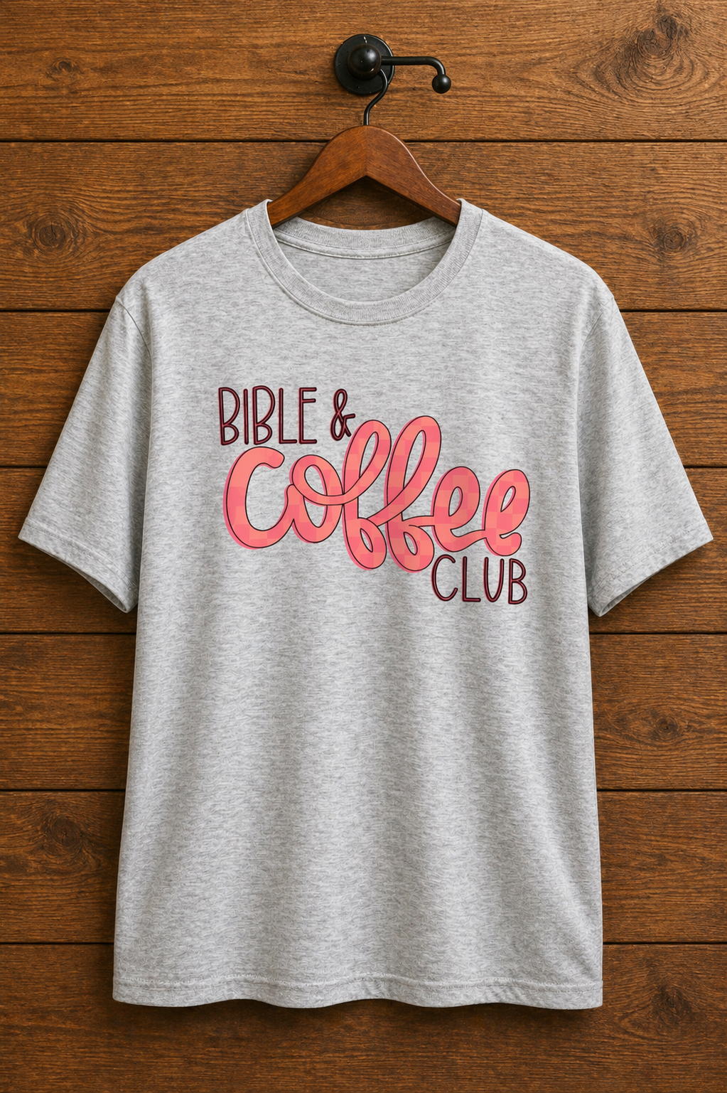 "Bible & Coffee Club Christian t-shirt in Sport Grey — bold coral script graphic for women who run on Jesus and coffee, by Pressed in Faith by Anna"