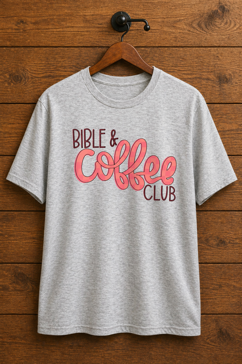 "Bible & Coffee Club Christian t-shirt in Sport Grey — bold coral script graphic for women who run on Jesus and coffee, by Pressed in Faith by Anna"