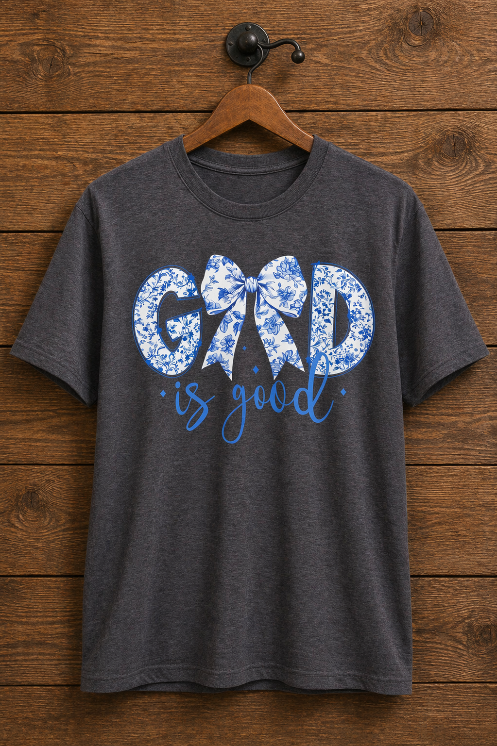 "God Is Good Floral Bow Christian t-shirt in Heather Dark Grey — blue and white chinoiserie floral lettering with bow detail by Pressed in Faith by Anna"