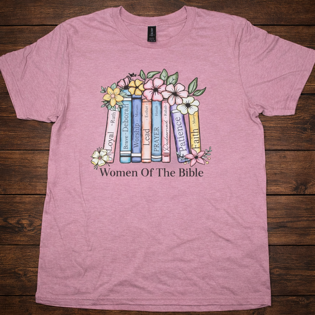 "Women of the Bible Christian t-shirt in Plumrose — beautiful floral watercolor book spine graphic featuring Ruth, Deborah, Esther, Hannah, Mary and more by Pressed in Faith by Anna"