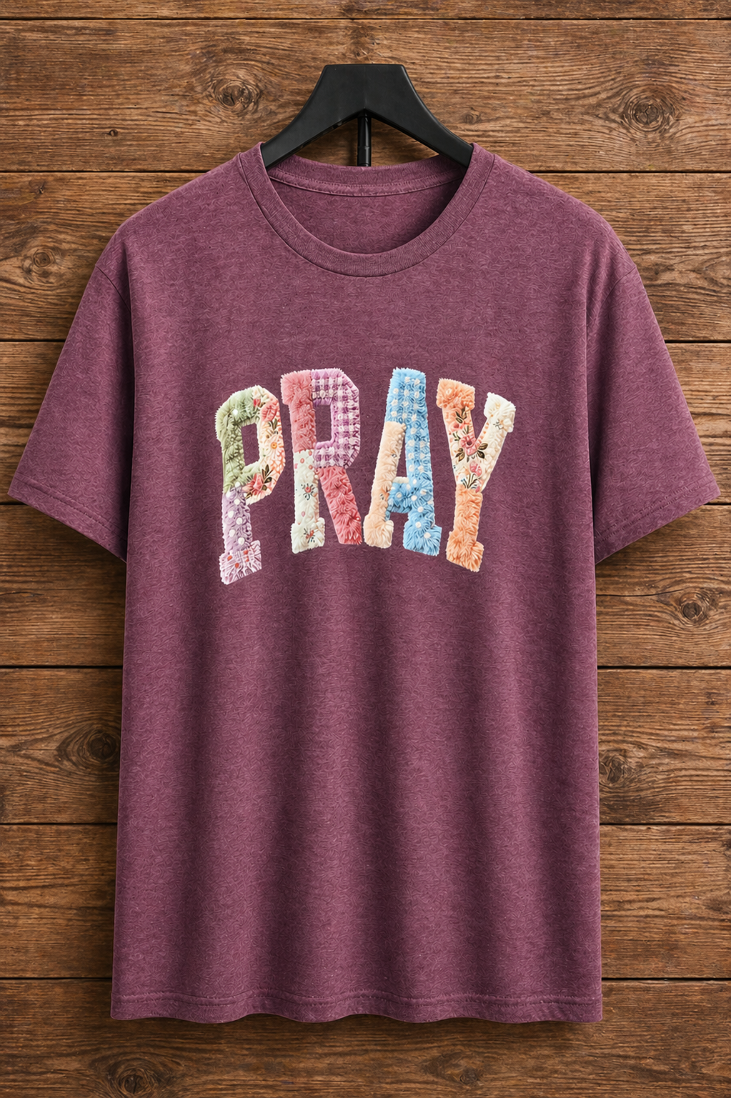 "PRAY Patchwork Floral Christian t-shirt in Heather Maroon — colorful chenille-style lettering with floral details by Pressed in Faith by Anna"