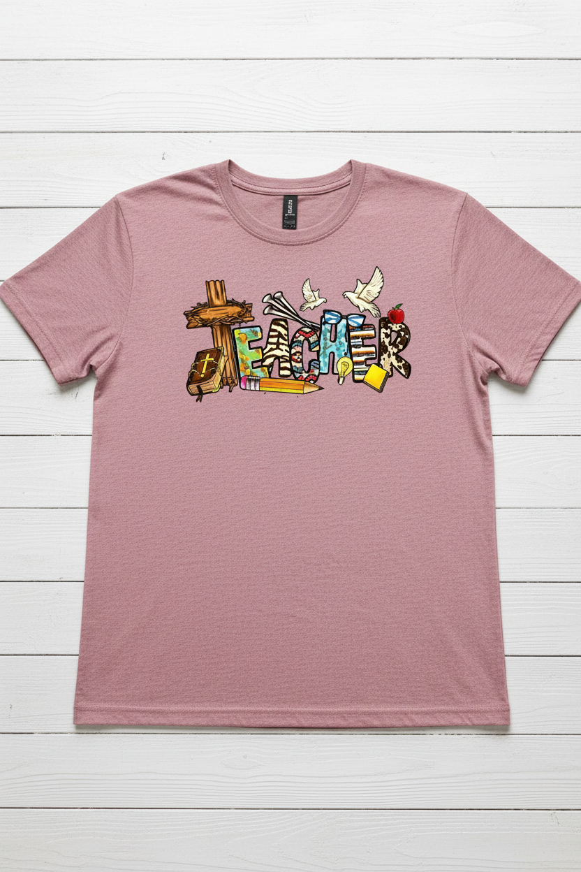 Christian Teacher T-Shirt in Plumrose — faith-inspired teacher graphic with cross, Bible, and dove by Pressed in Faith by Anna"