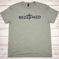 "Redeemed Cross Christian t-shirt in Heather Military Green — bold minimalist REDEEMED lettering with cross graphic by Pressed in Faith by Anna"