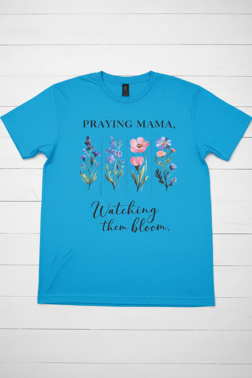 "Praying Mama Watching Them Bloom Christian t-shirt in Blue — watercolor wildflower graphic by Pressed in Faith by Anna"