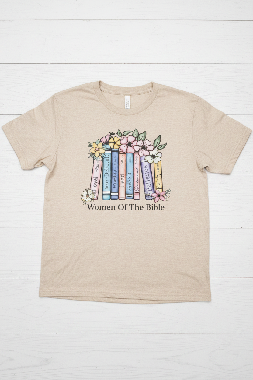  "Women of the Bible Christian t-shirt in Heather Oatmeal — soft pastel floral book spine graphic by Pressed in Faith by Anna"
